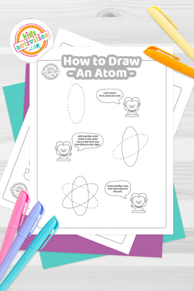 Black and white coloring pages with a tutorial on how to draw an atom lying on top of a blue-green sheet with multicolored letters on a gray background.