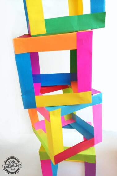 Build a tower with your kids out of paper boxes Super colorful and cool
