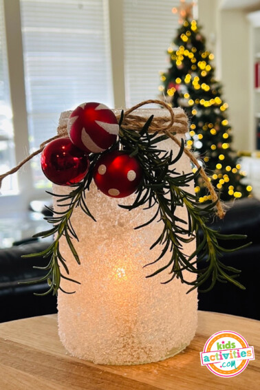 Image shows a finished christmas craft on a table. from Kids Activities Blog