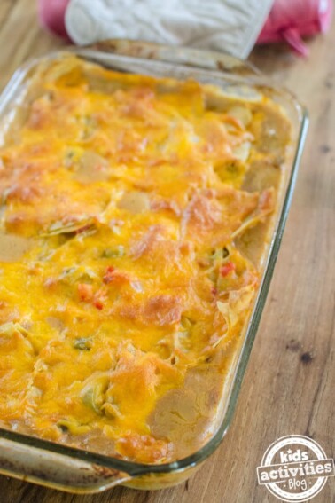 King Ranch chicken casserole finished recipe in casserole dish on table - Kids Activities Blog
