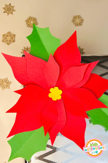Image shows a christmas poinsettia finished craft. from Kids Activities Blog