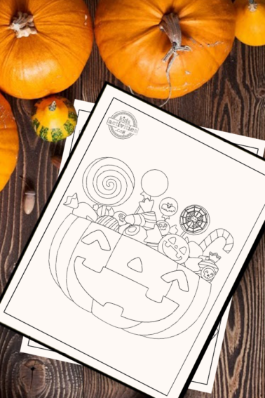 Halloween Candy Coloring Page of a jack o lantern pumpkin overflowing with candy. The coloring page is on a wooden surface surrounded by small pumpkins