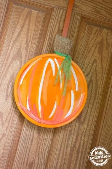 Make This Super Cute Halloween Pumpkin Door Hanger